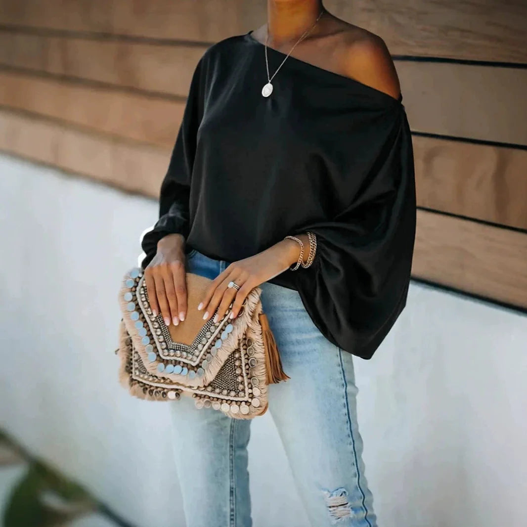 Black Women's Satin Blouse with Asymmetric Off-Shoulder Neckline & Batwing Sleeves - Front Pose Clutch