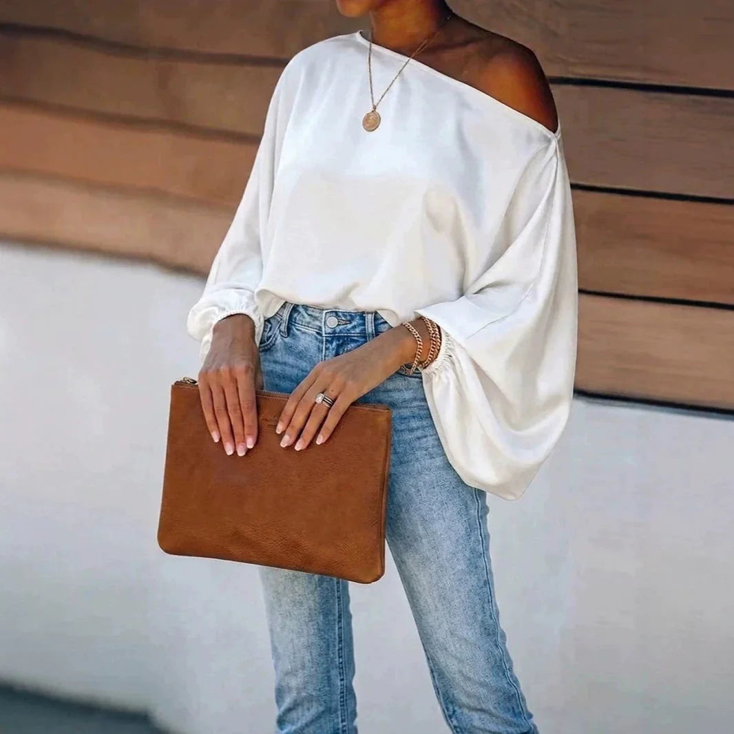 White Women's Satin Blouse with Asymmetric Off-Shoulder Neckline & Batwing Sleeves - Front Pose Clutch