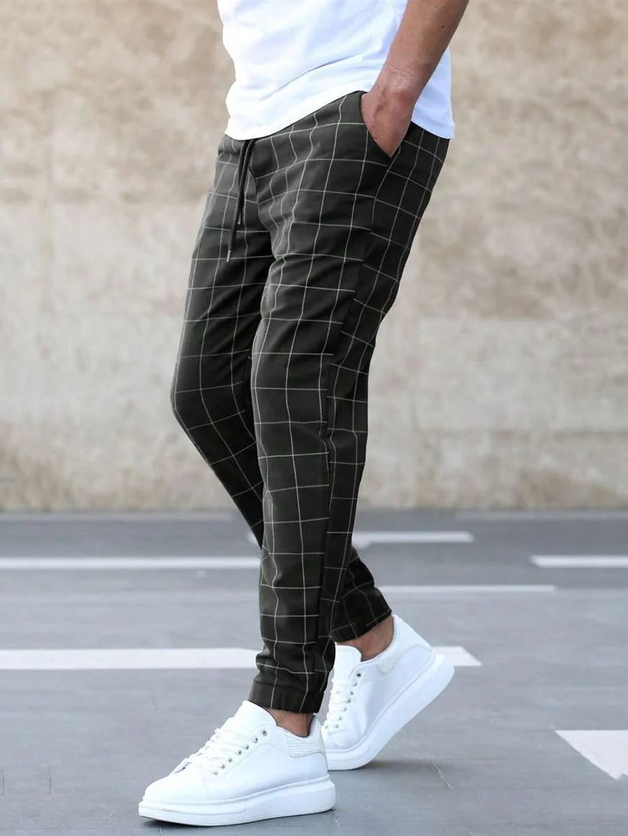 Men's Windowpane Plaid Trousers with Drawstring Waist & Tapered Fit - Side Walking Motion