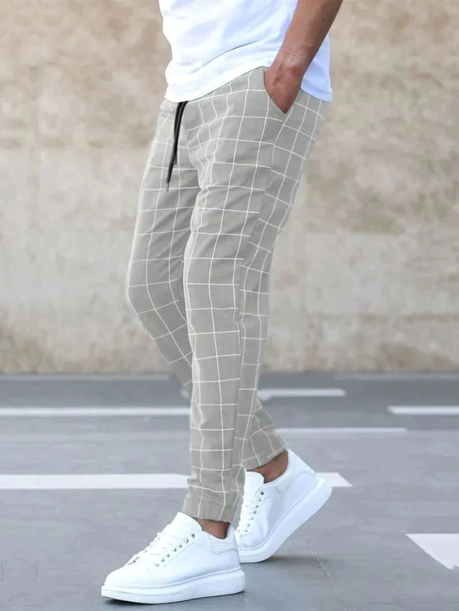 Men's Windowpane Plaid Trousers with Drawstring Waist & Tapered Fit - Side Pose Close