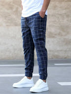 Dark Blue Men's Windowpane Plaid Trousers with Drawstring Waist & Tapered Fit - Front Full Standing