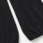 Black Women's Halter Cowl-Neck Wide-Leg Jumpsuit with Elastic Waist & Pockets — Dolly - Close Up Hem Cuff