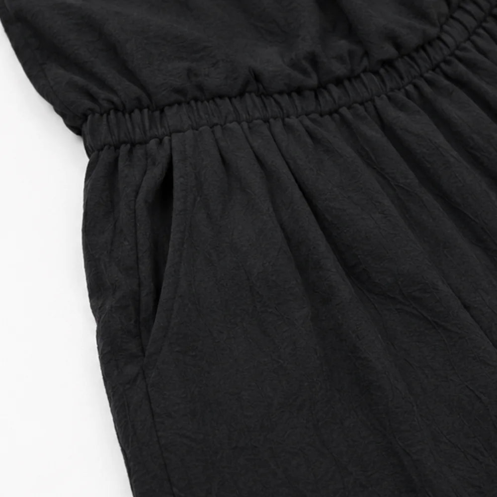 Black Women's Halter Cowl-Neck Wide-Leg Jumpsuit with Elastic Waist & Pockets — Dolly - Close Up Waist Pocket