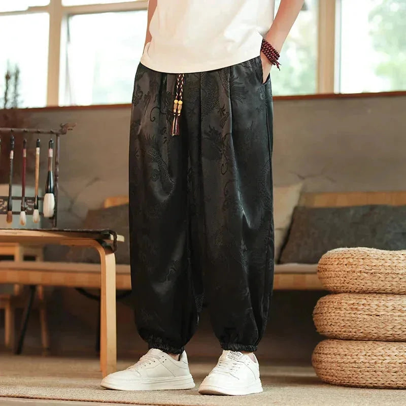 Men's Wide-Leg Jacquard Satin Harem Pants with Drawstring & Elastic Cuffs - Front Standing