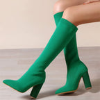 Green Women's Knee High Boots with Stretch Knit Sock Fit & Block Heel - Seated Pose