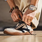 Beige Men's Classic Sneakers with Lace-Up Closure & Colorblock Design - Tying Laces Closeup
