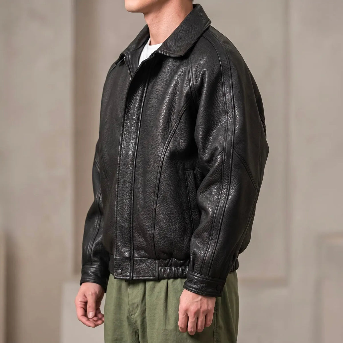 Black Men's Leather Jacket with Structured Collar & Relaxed Fit — Griffin - Side Pose