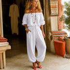 White Women's Off Shoulder Jumpsuit with Puff Sleeves & Relaxed Wide-Leg Fit — Brittany - Front Pose Boutique