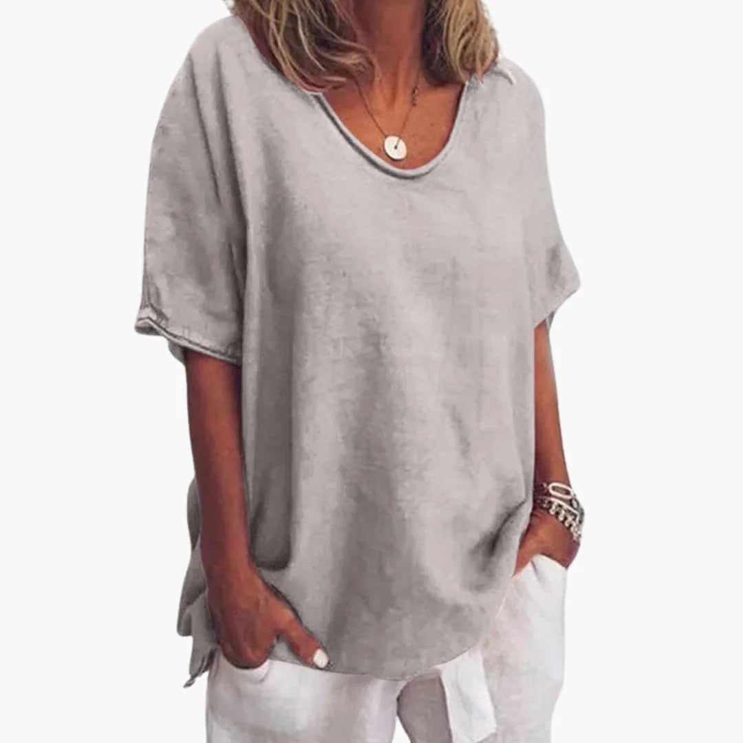 Grey Women's Oversized V-Neck Short Sleeve Blouse with Curved Hem - Studio Pose