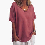 Red Women's Oversized V-Neck Short Sleeve Blouse with Curved Hem - Close Up Torso