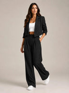 Black Women's Two-Piece Blazer Set with Pinstripe Cropped Jacket & Wide-Leg Pants — Claire - Model Walking