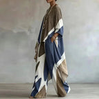 Blue Women's Abstract Print Trouser Set with Wide-Leg Pants & Draped Poncho Top — Skylar - Side Profile