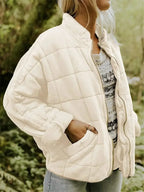 White Women's Quilted Jacket with Zip Pockets & Relaxed Oversized Fit - Front Studio