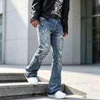Blue Men's Ripped Slim-Fit Bootcut Jeans with Raw-Hem Cuffs — Harrison - Front Angle Steps