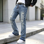 Blue Men's Ripped Slim-Fit Bootcut Jeans with Raw-Hem Cuffs — Harrison - Side Walking