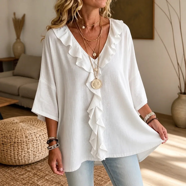 White Women's Oversized Ruffle Blouse with V-Neck & Three-Quarter Sleeves — Nell - Close Up Neckline