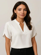 White Women's Blouse with Split V-Neck & Draped Cape Sleeves — Rosalie - Studio Portrait