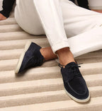 Dark Blue Men's Suede Lace-Up Loafers with Moc Toe Design - Seated Lifestyle Pose