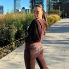 Coffee Brown Women's Velour Tracksuit with Cropped Zip Jacket & Rhinestone Logo - Side Pose Outdoor