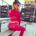 Magenta Women's Velour Tracksuit with Cropped Zip Jacket & Rhinestone Logo - Side Seated Bench