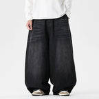 Black Men's Baggy Jeans with Wide-Leg Silhouette & Relaxed Low-Crotch Fit — Edmund - Front Cropped View