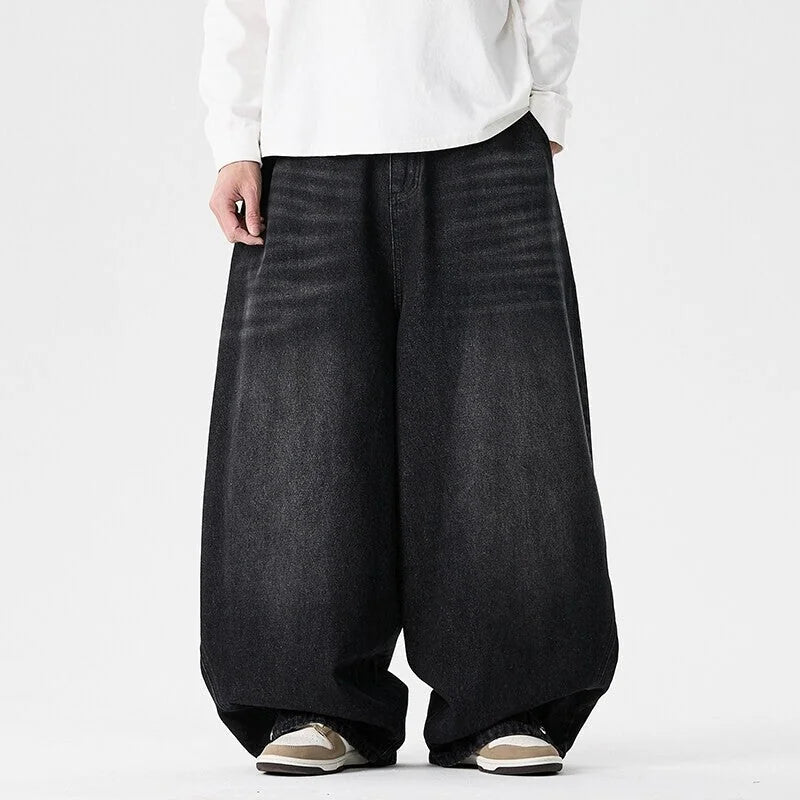 Black Men's Baggy Jeans with Wide-Leg Silhouette & Relaxed Low-Crotch Fit — Edmund - Front Cropped View