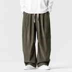 Military Green Men's Wide-Leg Corduroy Pants with Drawstring & Pleated Relaxed Fit — Beckett - Front Mid
