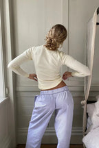 Purple Women's Wide-Leg Lounge Pants with Elastic Waistband & Side Pockets — Zora - Back Pose
