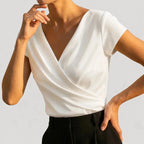 White Women's Satin Wrap Blouse with Draped V-Neck & Cap Sleeves — Winifred - Side Pose